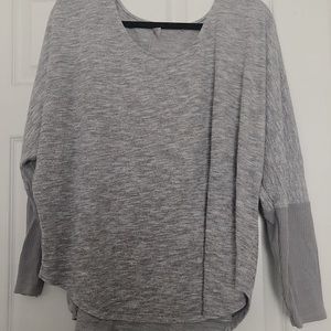 grey sweater.